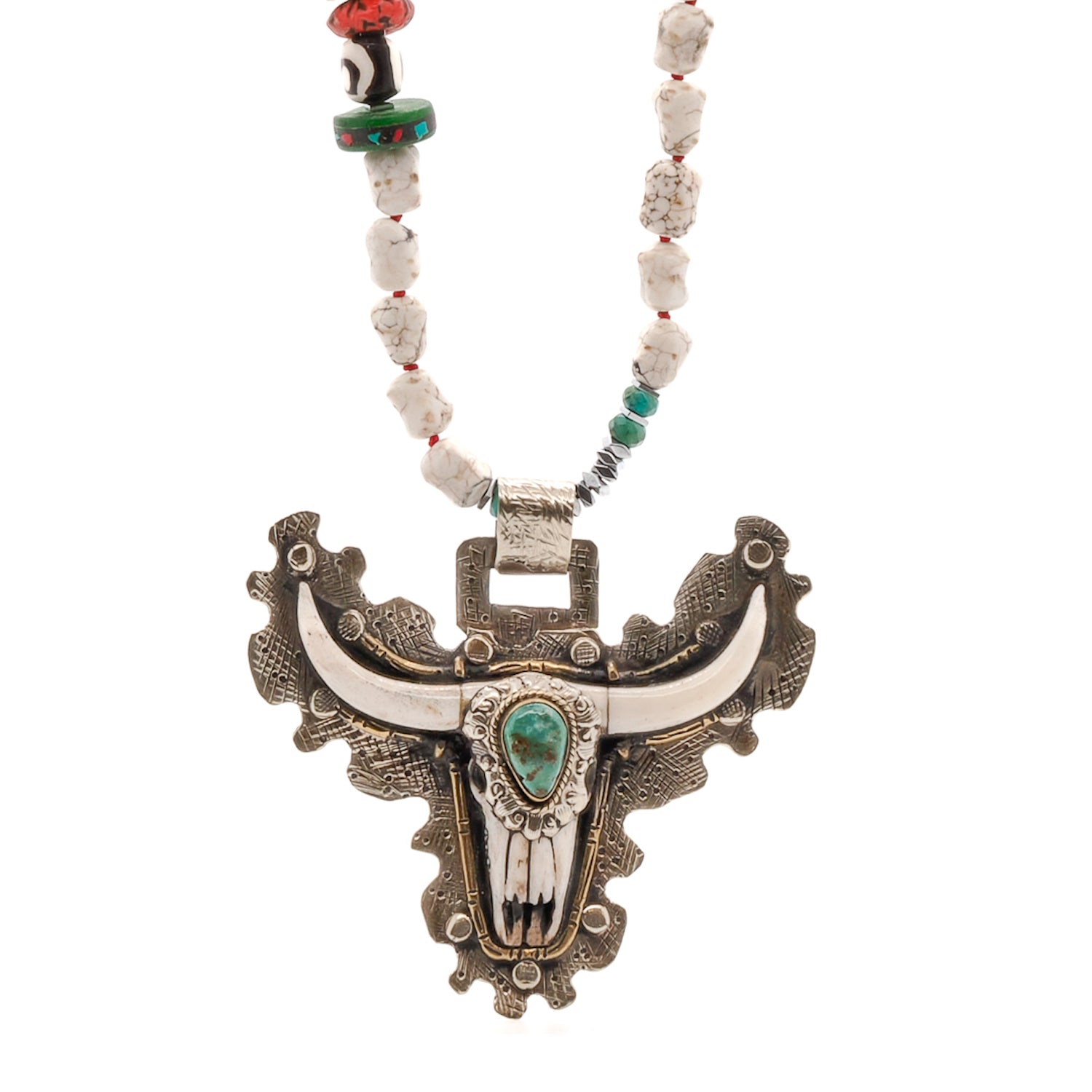 The Mystic Longhorn Unique Necklace, featuring the stunning handmade carved longhorn pendant and a combination of Tibetan, African, and Agate beads, radiating boldness and spiritual elegance.