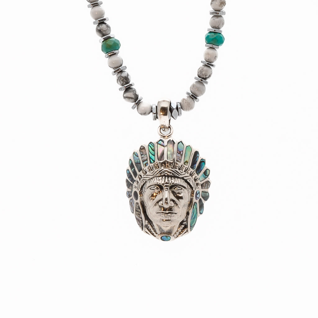 Close-up of the Native American Chief Necklace showcasing the sterling silver pendant with mother of pearl inlay.