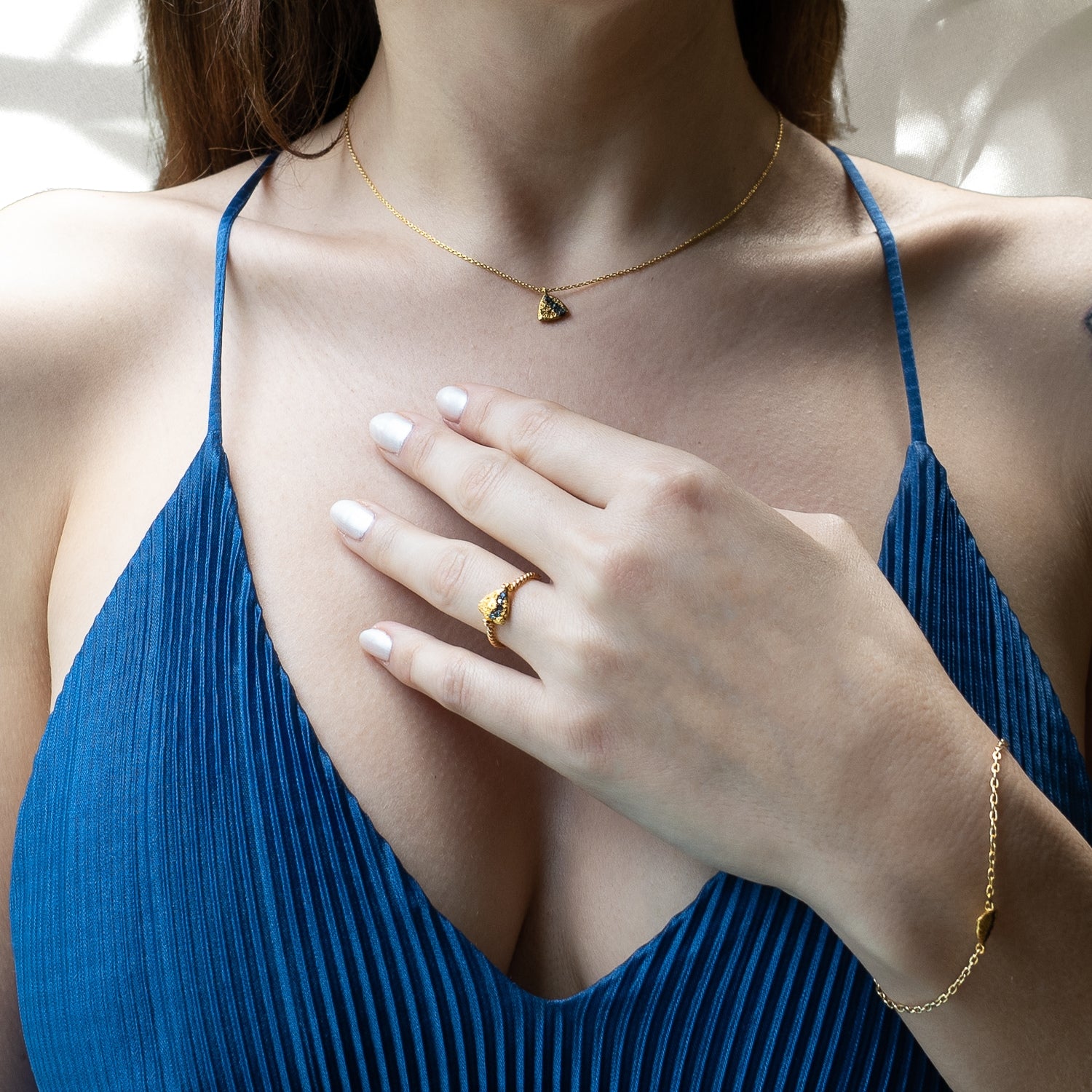 Adorned in Elegance - Model Wearing Nature Triangle Gold Diamond Necklace.