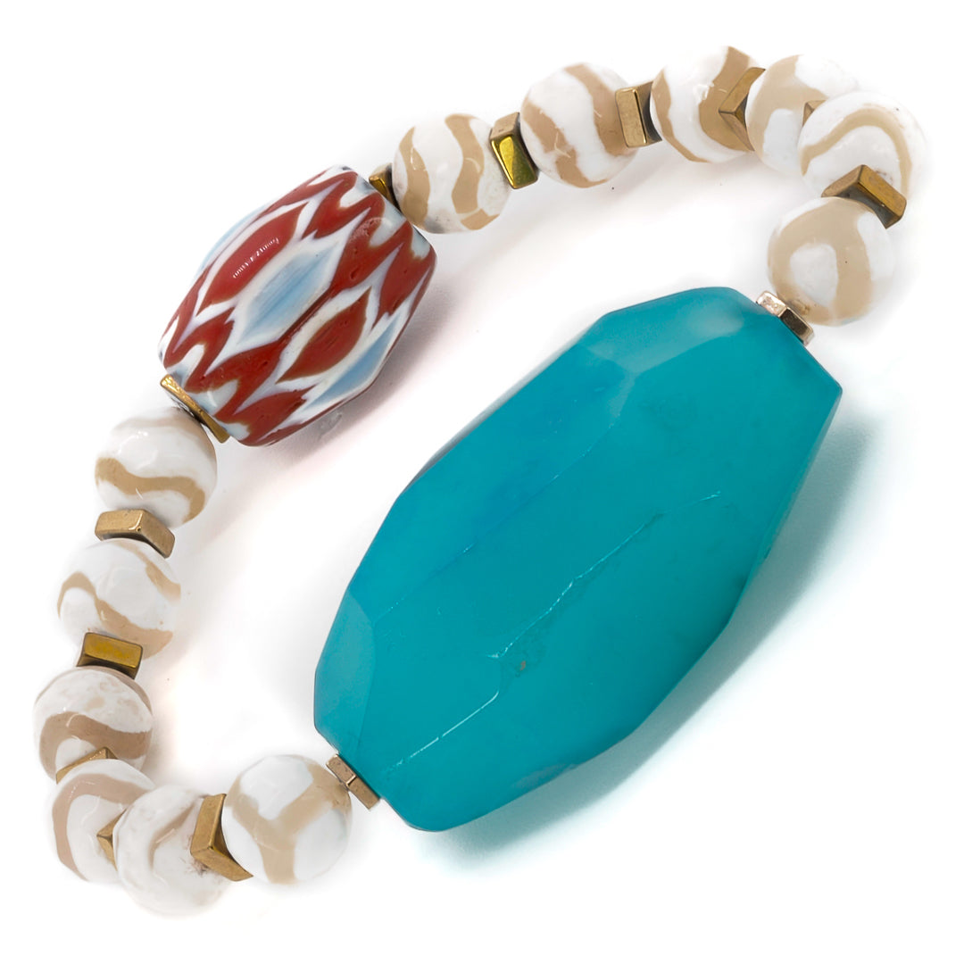 Experience the craftsmanship of the Nepal Blue Agate Bracelet, a one-of-a-kind piece designed to showcase the beauty of agate.