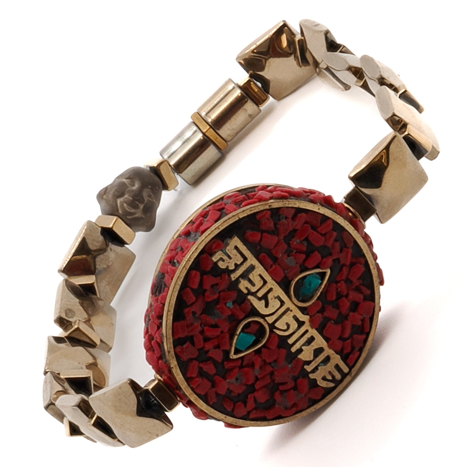 Experience the spiritual vibrations of the Om Mani Padme Hum Coral Mantra Bracelet, adorned with a Nepal mantra bead and hematite stone spacers.