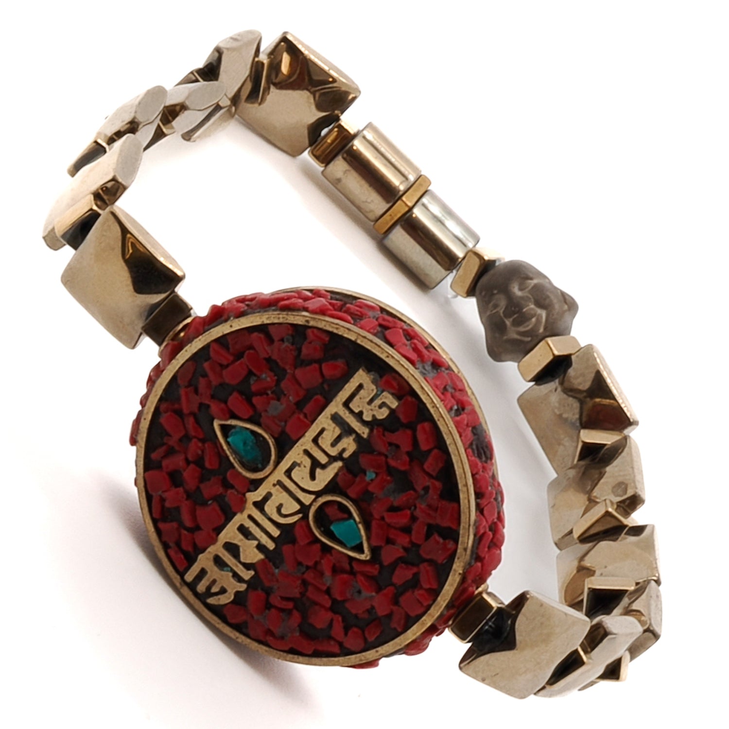 Find balance and harmony with the Om Mani Padme Hum Coral Mantra Bracelet, featuring a red coral and turquoise inlay mantra bead.