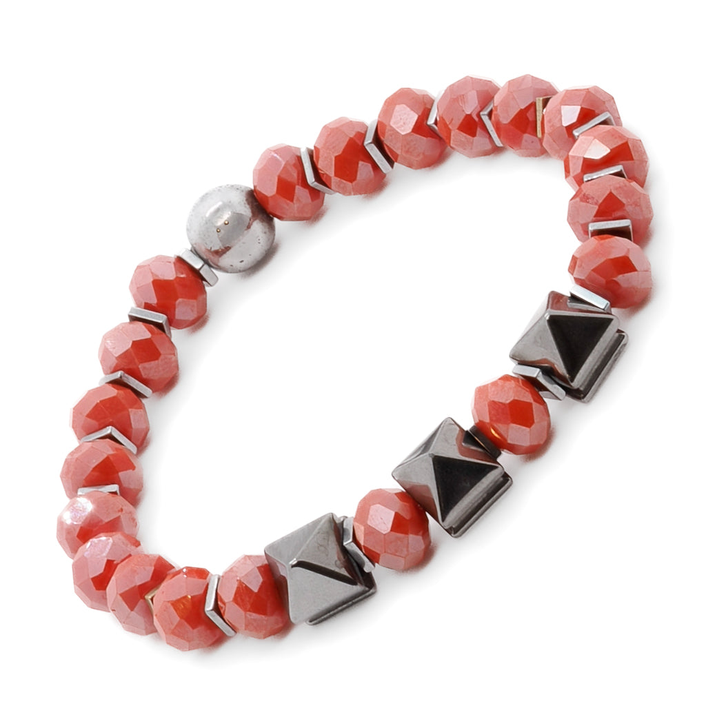 Embrace the energizing properties of the Orange Energy Bracelet, crafted with orange crystal beads and silver hematite stone beads.