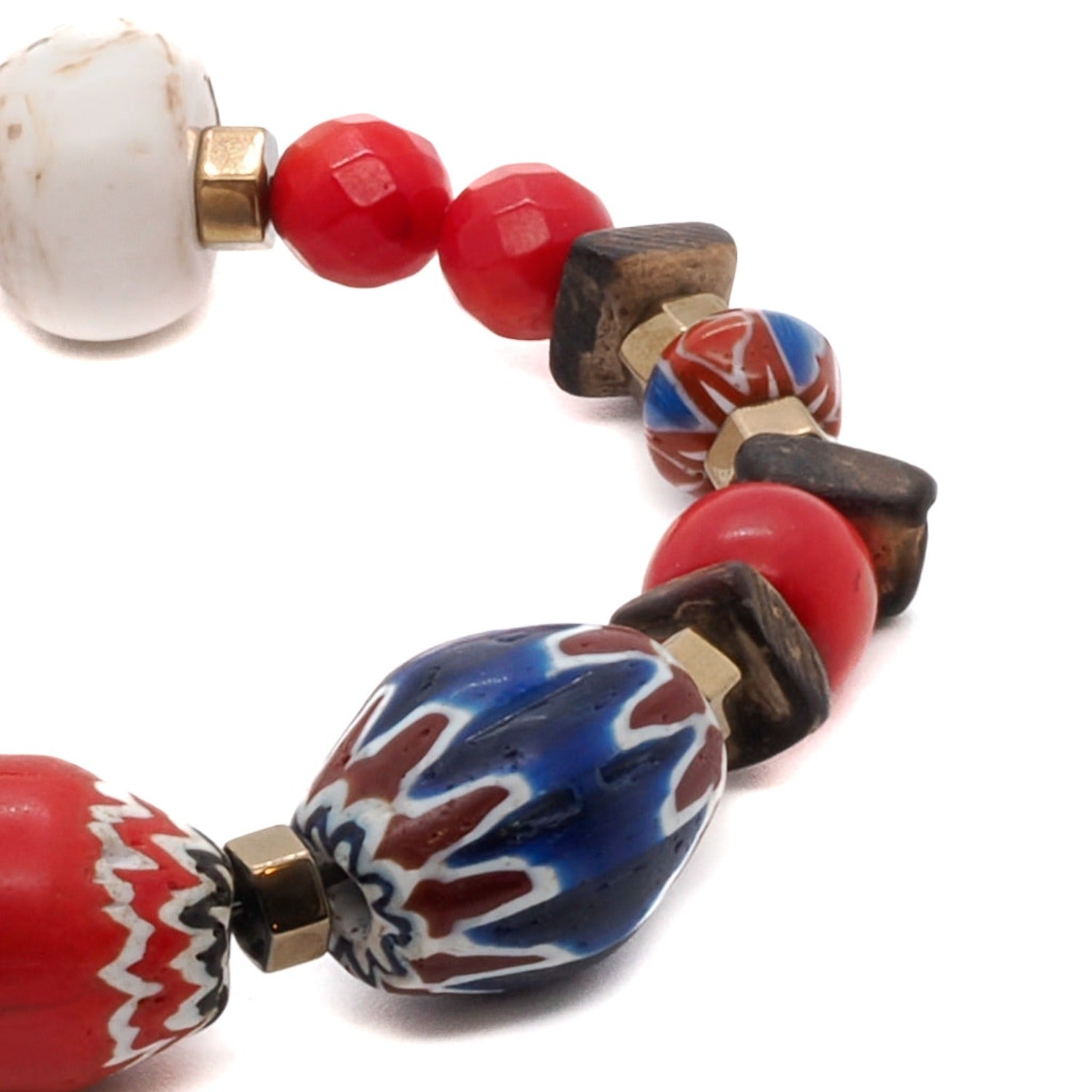 Experience the beauty and energy of the Palena Bracelet, handcrafted with attention to detail and featuring red coral stone.