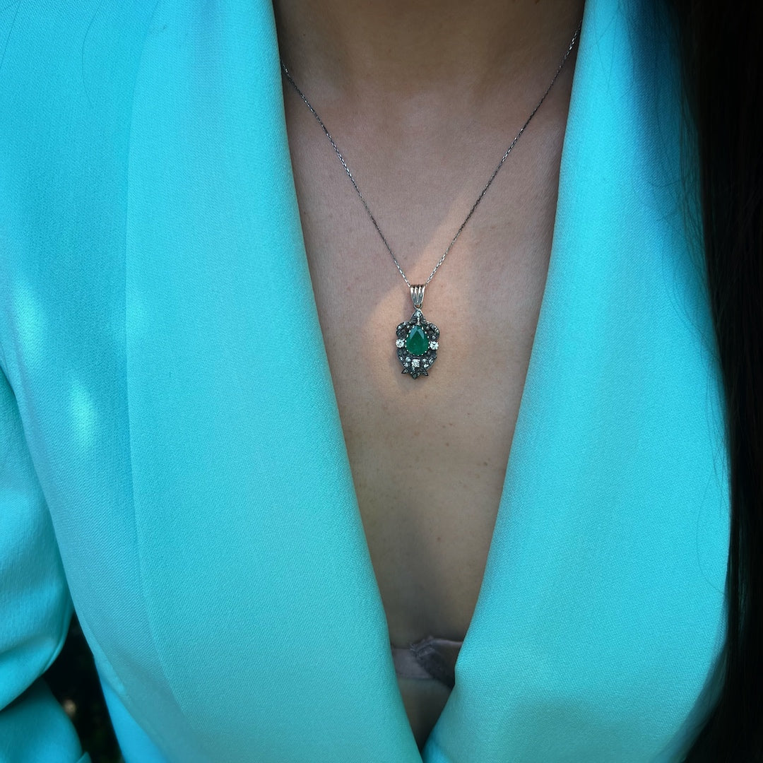 Unique Design - A pendant that captures attention with its elegant uniqueness, model wearing