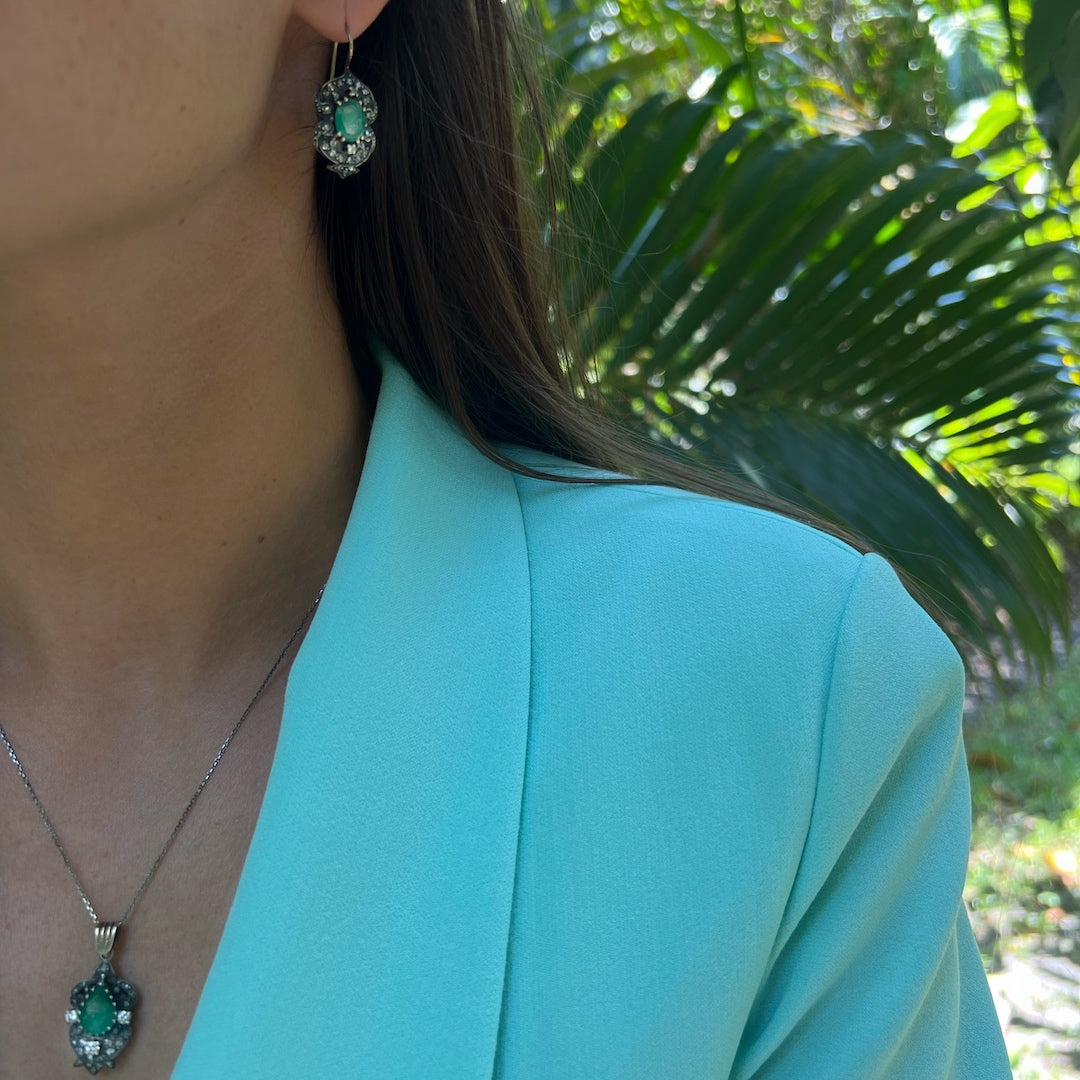 Captivating Presence - The model stands out with this one-of-a-kind pendant.