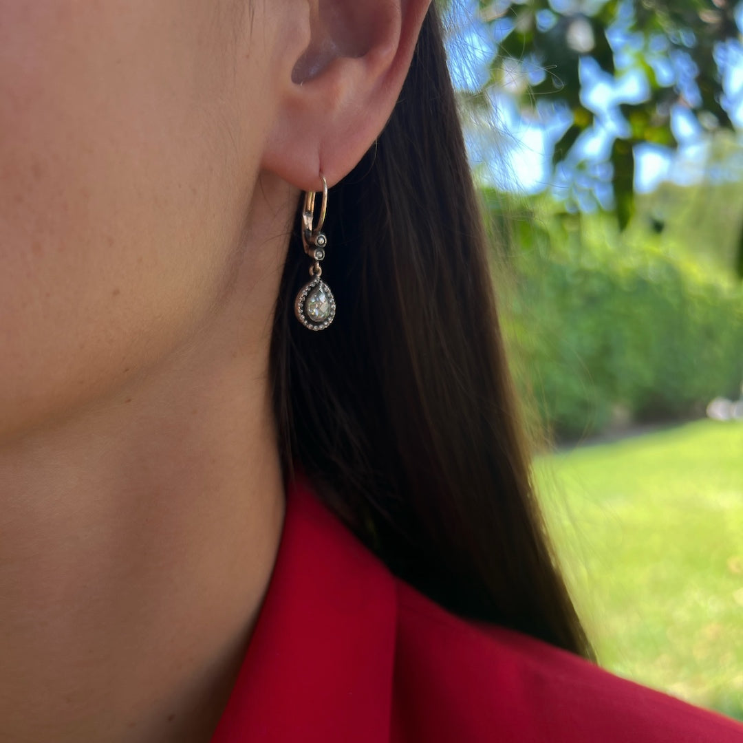 Unique and Meaningful - Model Wearing Pear Shaped Diamond Earrings.