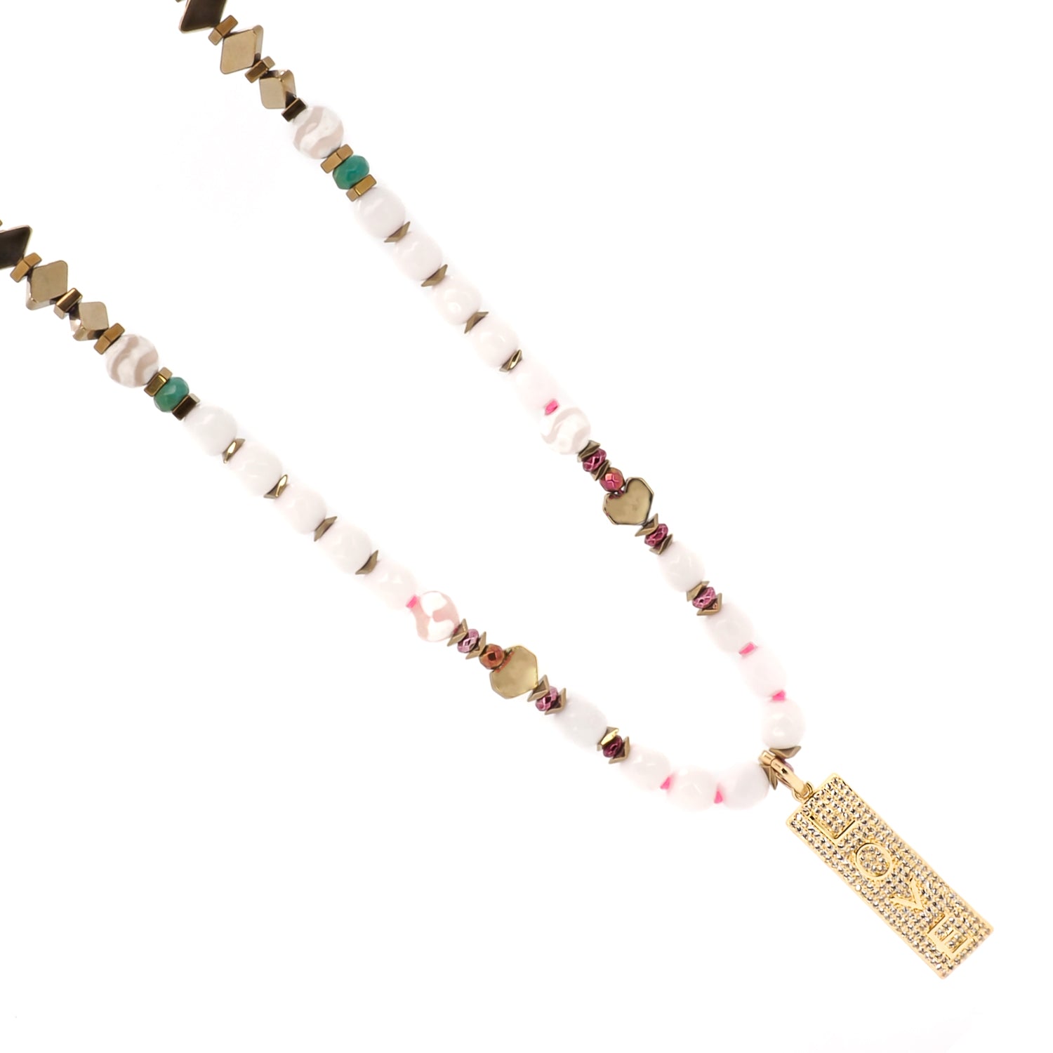 The white enamel heart bead on the necklace, symbolizing love and adding a touch of sweetness to the design.