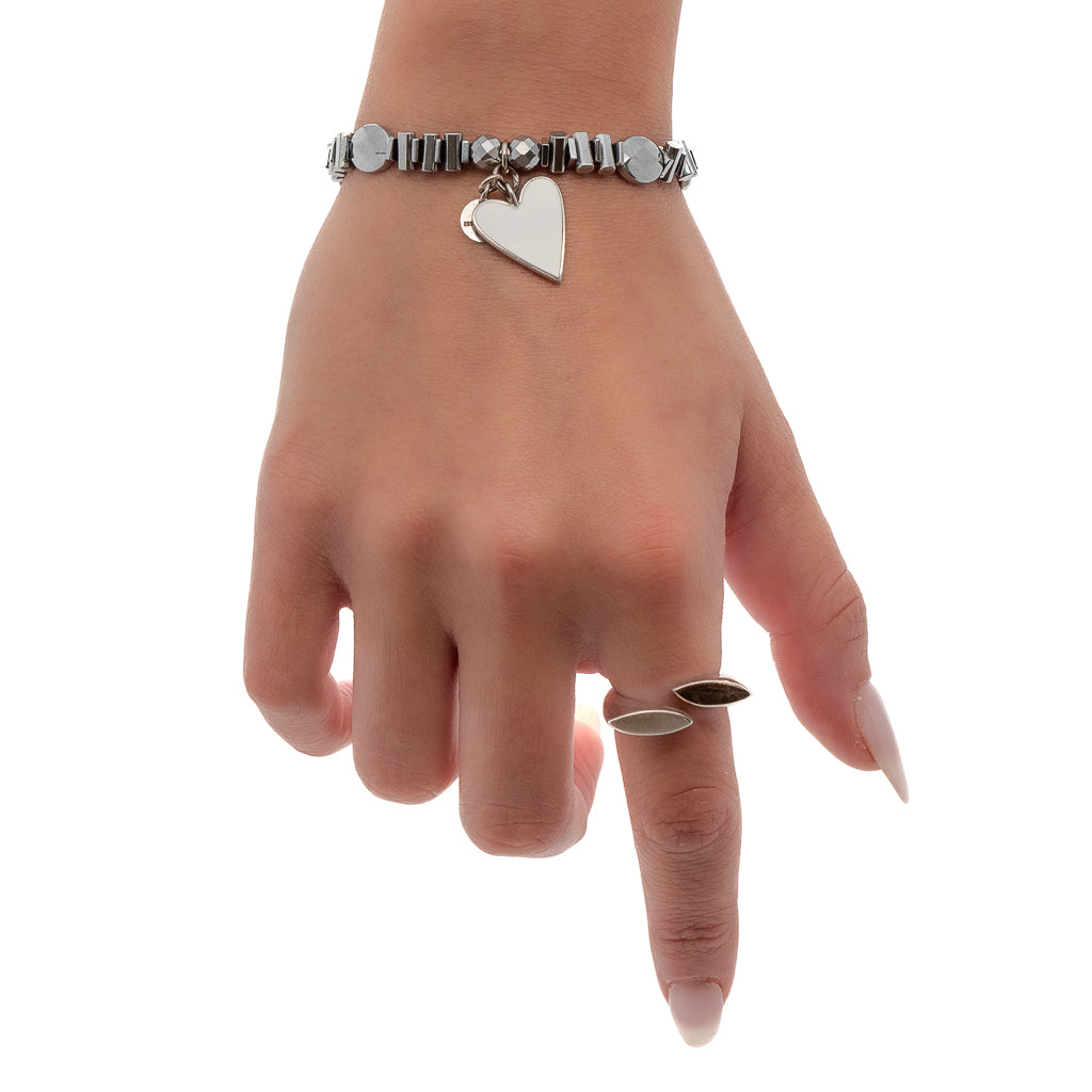 Experience the beauty of the Pure White Heart Bracelet as the model wears it