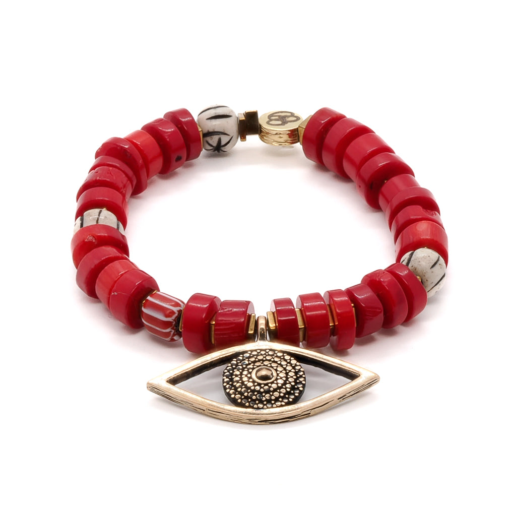 Embrace the powerful and vibrant style of the Red Coral Evil Eye Bracelet, featuring red coral beads and an evil eye charm.