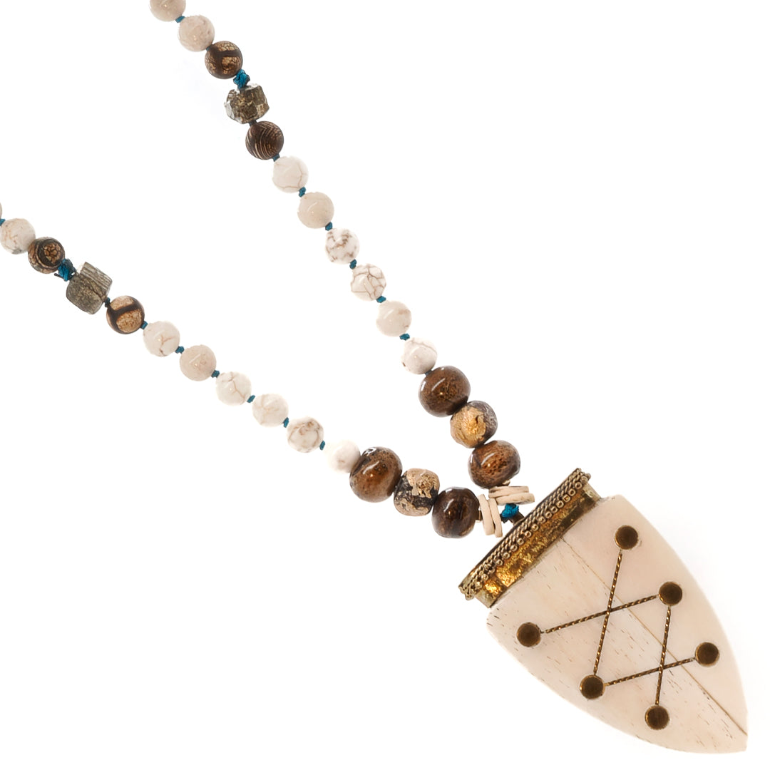 Discover the transformative power of the Spirits on the Run necklace, combining Tibetan and Nepalese beads for a Boho-inspired style.