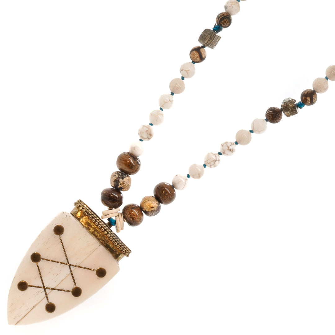 Embrace the healing properties of the Spirits on the Run necklace, featuring white agate stones known for their cleansing and stabilizing effects.