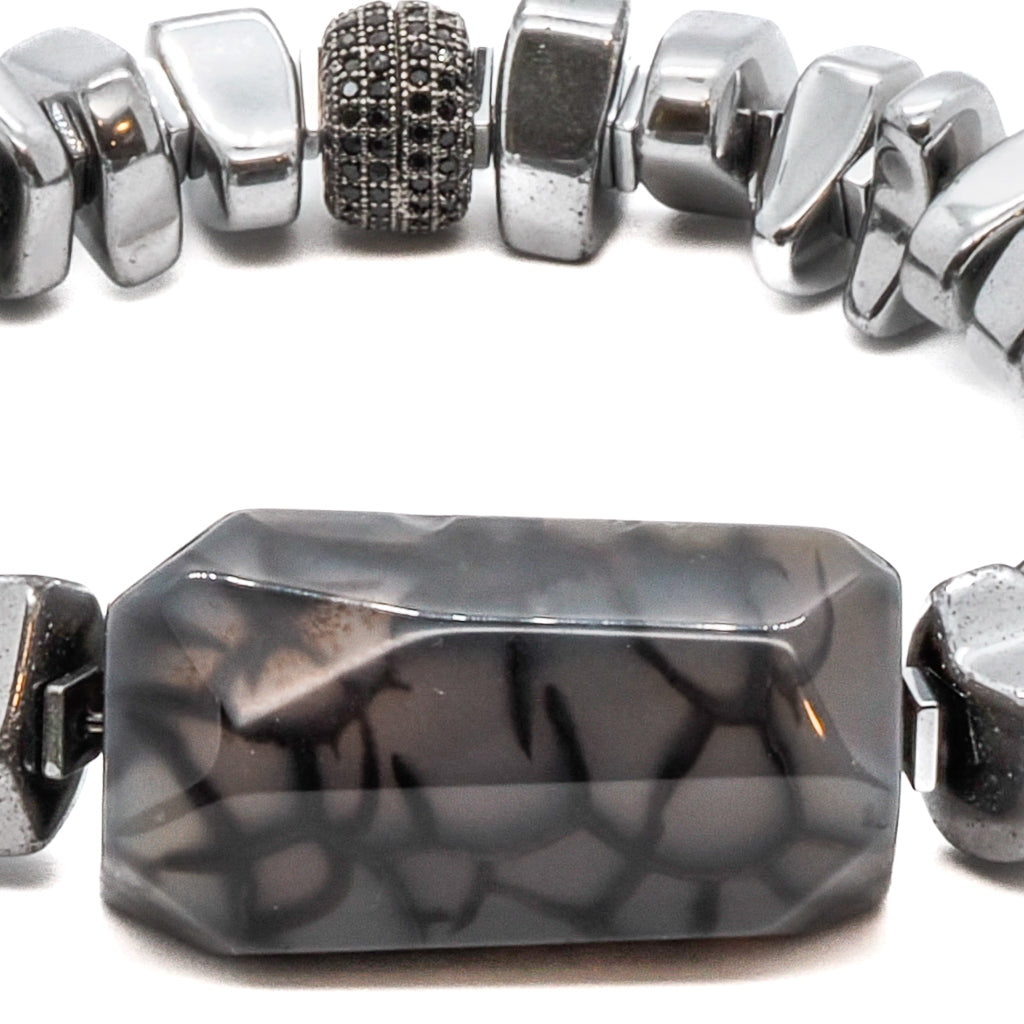 Experience the luxury of the Stylish Mila Bracelet, adorned with nugget silver color hematite beads and a captivating jasper stone.