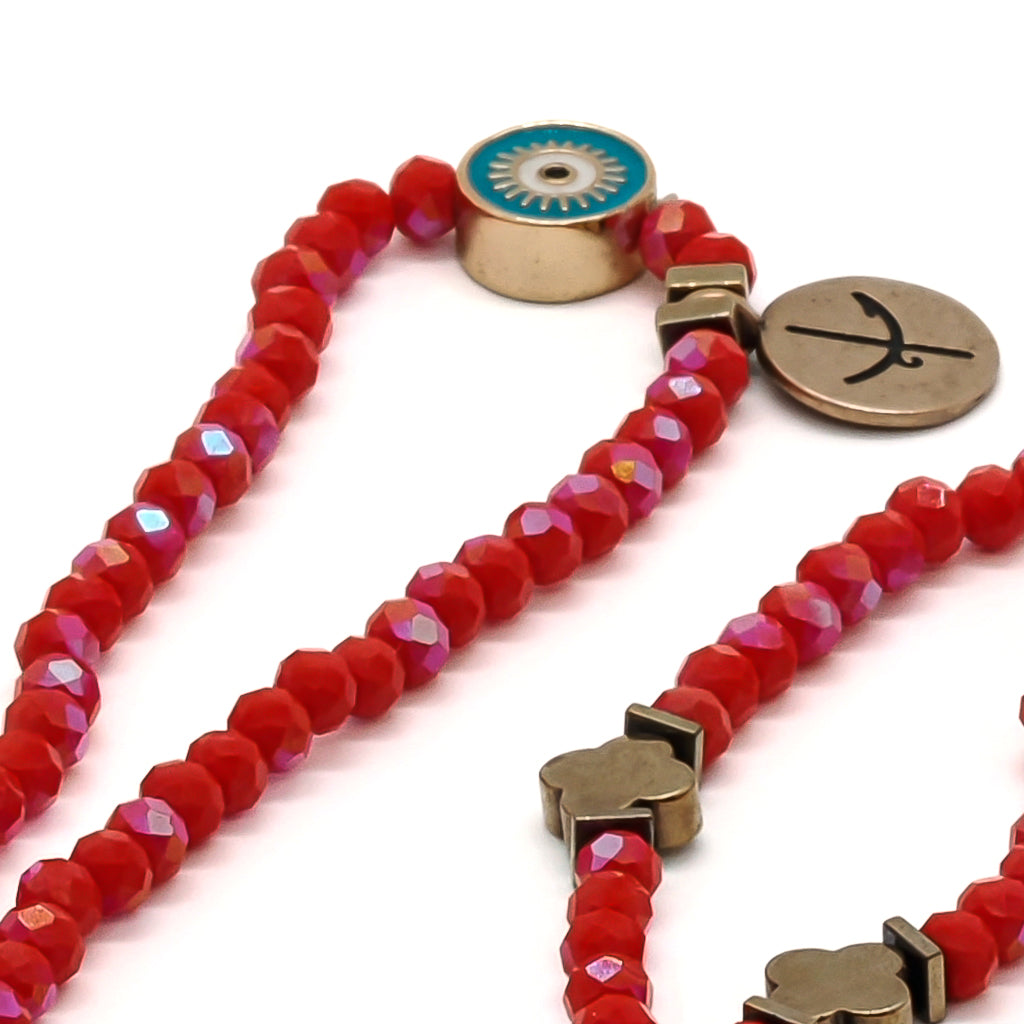 Close-up of the Summer Lucky Elephant and Evil Eye Necklace, highlighting its vibrant colors and unique design.