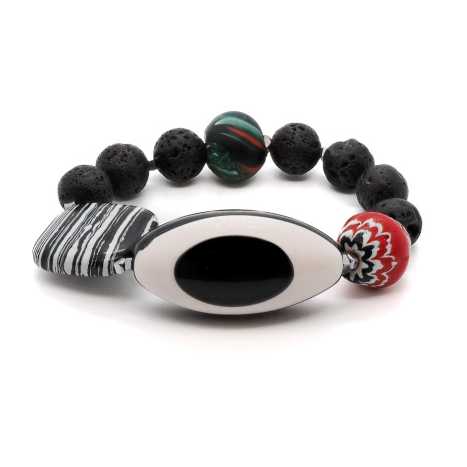 Discover the unique style of the Third Eye Bracelet, featuring vibrant red Nepal handmade beads and a striking eye resin bead centerpiece.