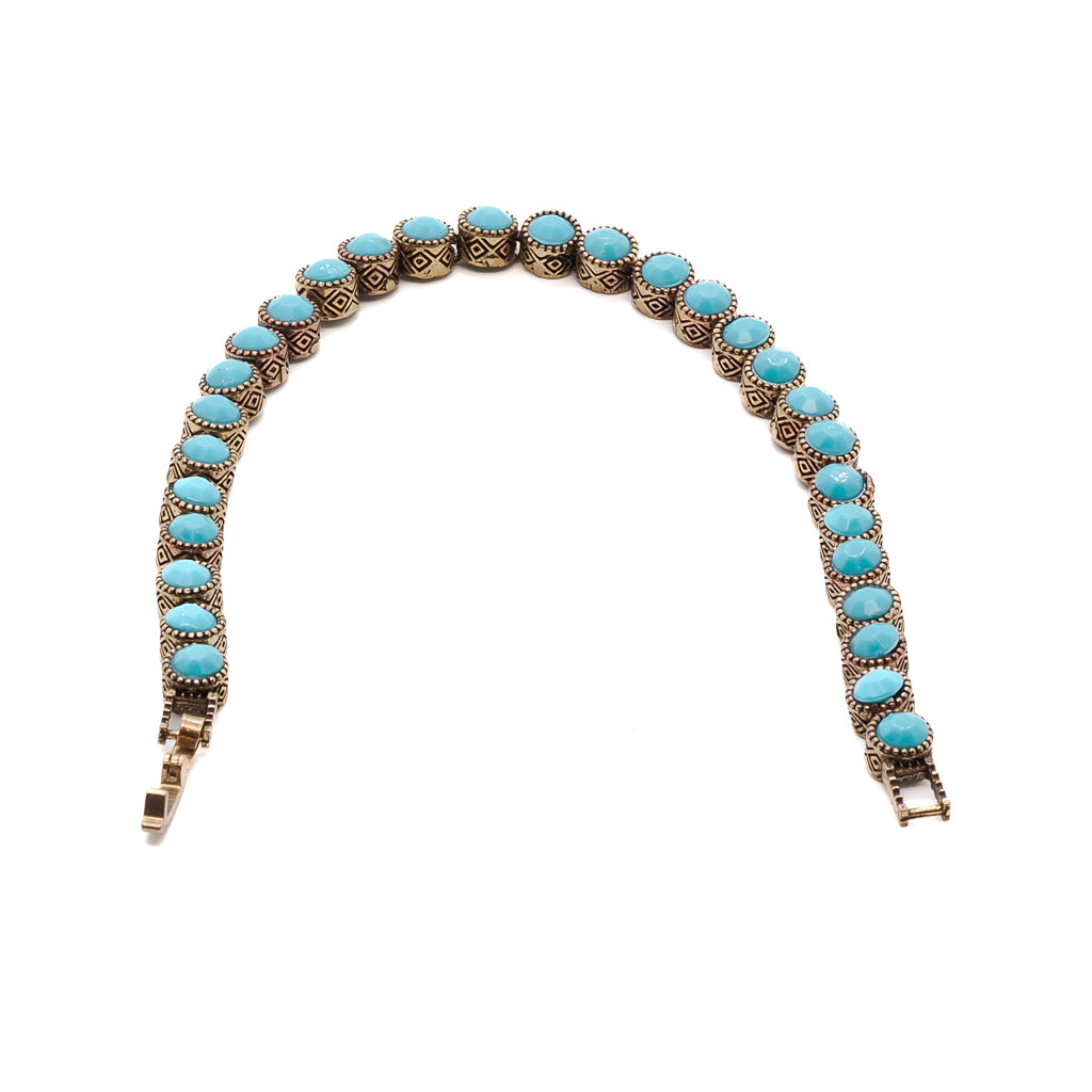 The energy-infused Turquoise Tennis Bracelet, a unique and meaningful accessory.