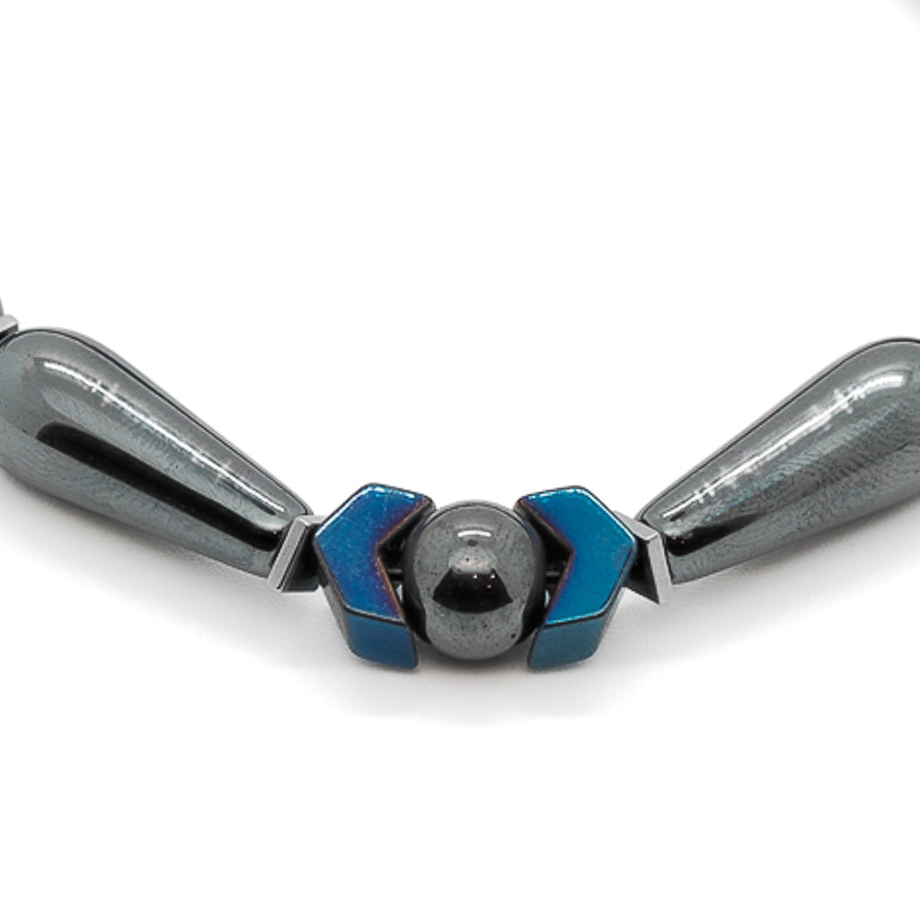 Bold men’s bracelet combining teardrop hematite, blue arrow beads, and elegant silver lapis.