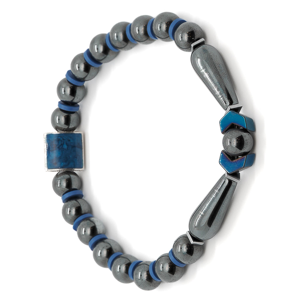 Artisan-crafted bracelet with natural hematite stones and sterling silver lapis lazuli inlay.