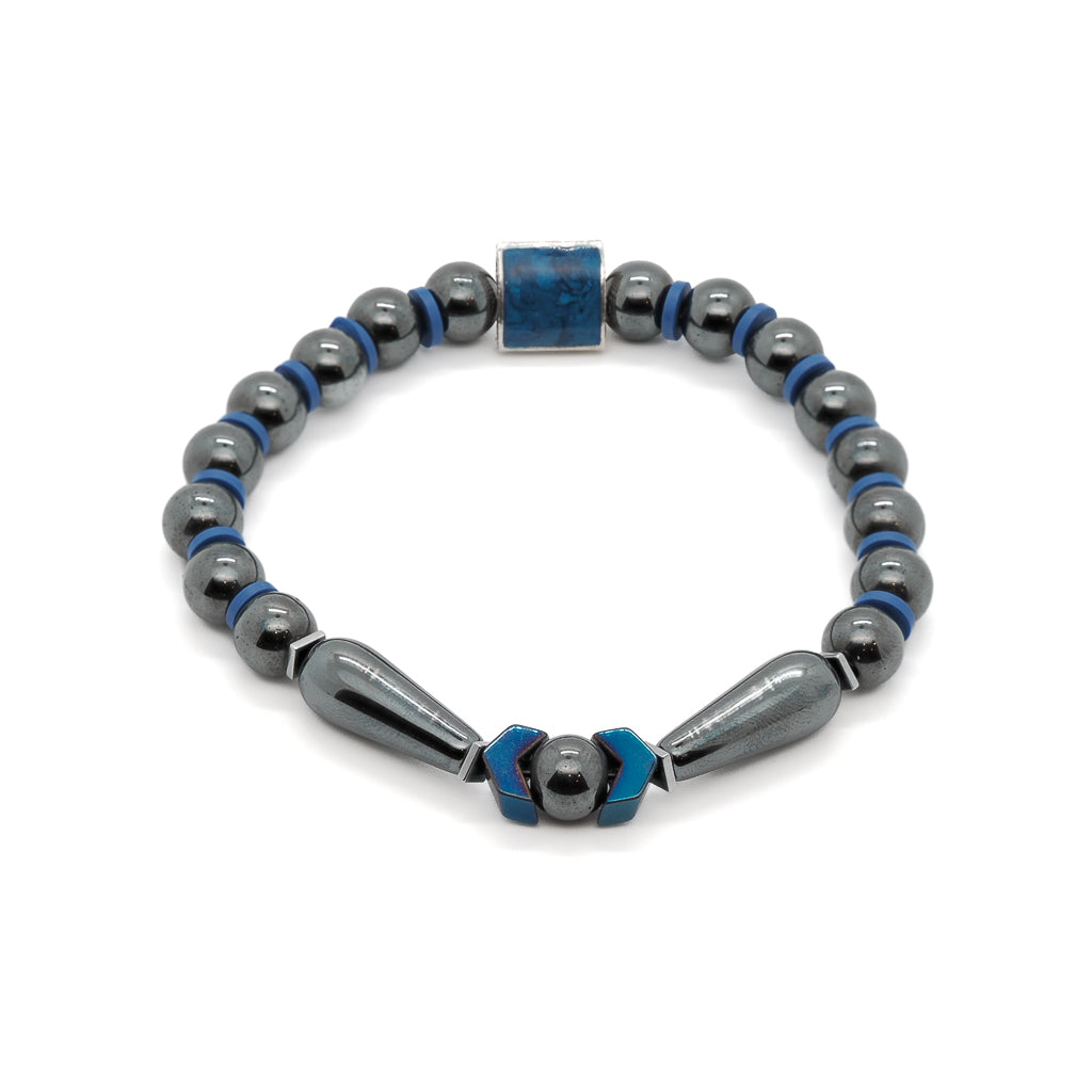 Men's bracelet with teardrop hematite beads, blue arrow hematite, and silver lapis inlay accent.