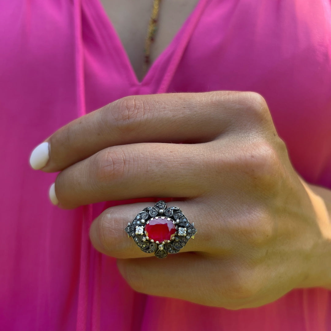 Model Wearing Oval Ruby Ring - A striking statement piece with an 8K rose gold band, adorned with a 1.80ct ruby and 0.11ct diamonds.