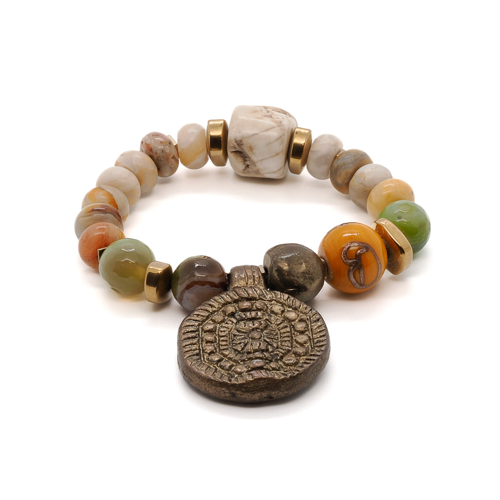 Admire the vintage charm of the Vintage Style Unique Bracelet, featuring agate stones and a gold-plated vintage Nepal bead.