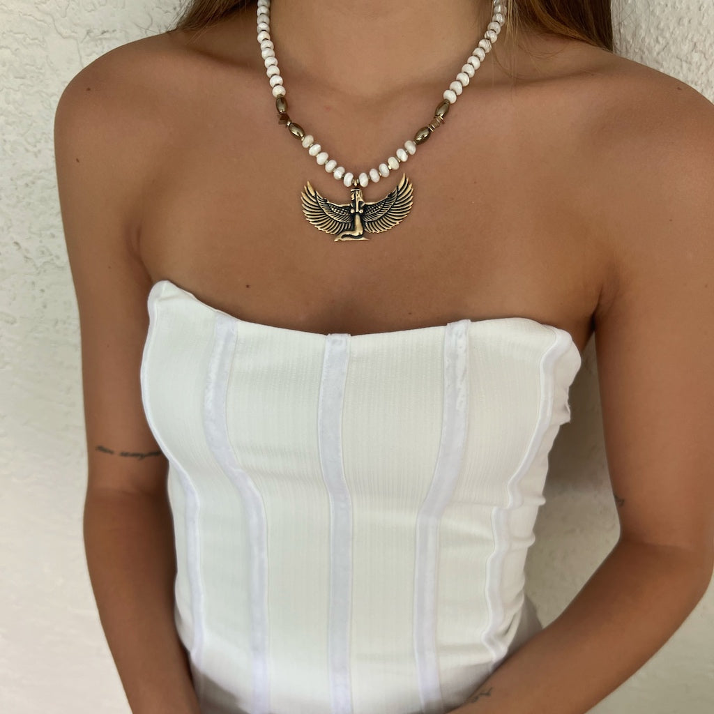 Elegant model showcasing the Handmade Isis Necklace, radiating healing energy.
