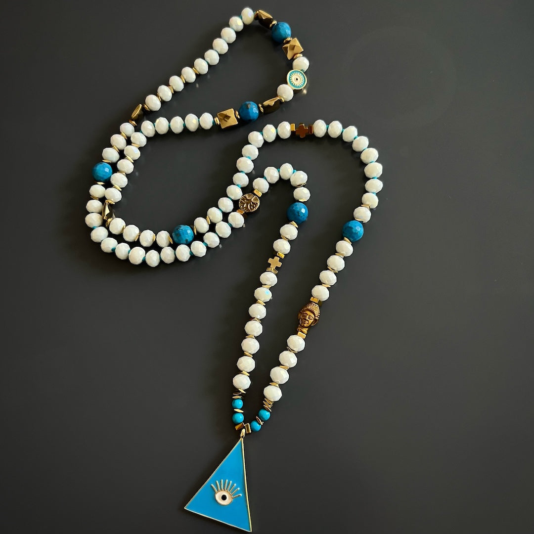 Beautiful Evil Eye Necklace with turquoise and gold details.
