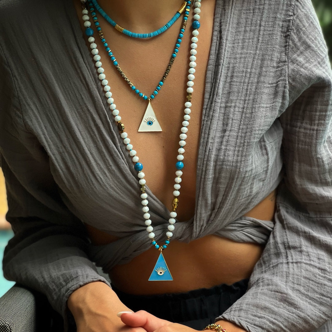 Stylish model showcasing the Handmade Evil Eye Necklace with confidence.