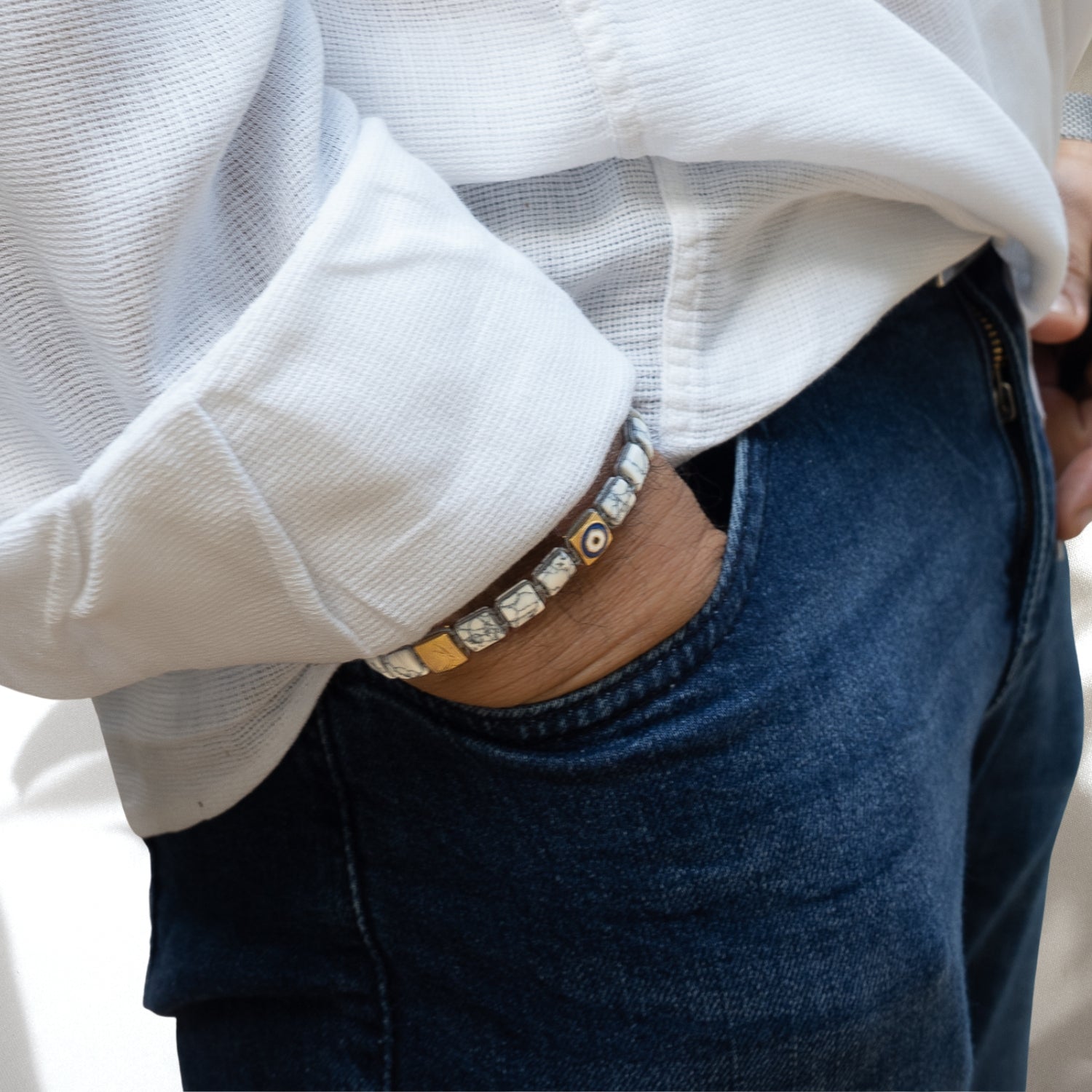Model Wearing Woven Fortune Evil Eye Bracelet - Embracing elegance and protection.