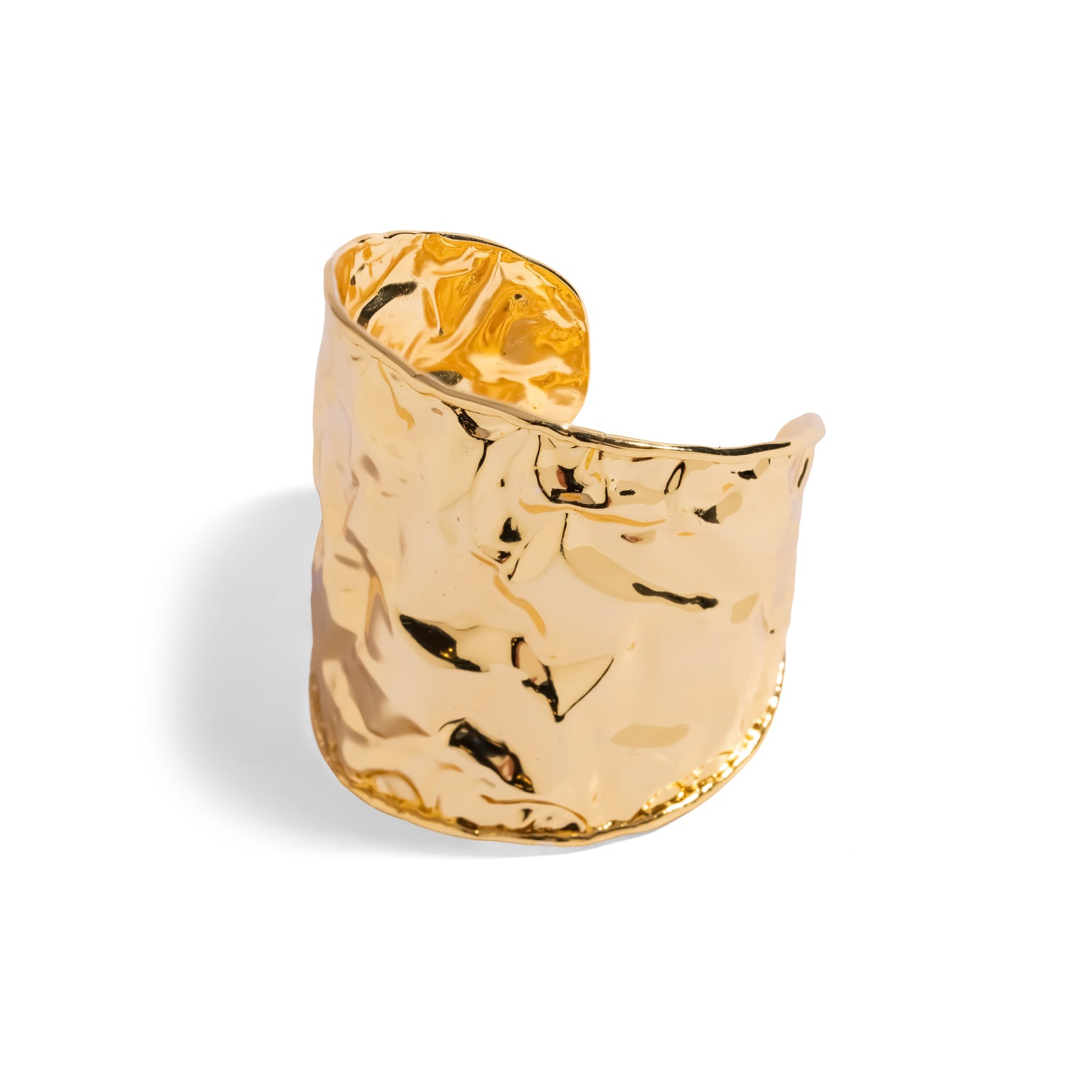 Wide crumpled gold statement cuff bracelet with a molten rippled surface