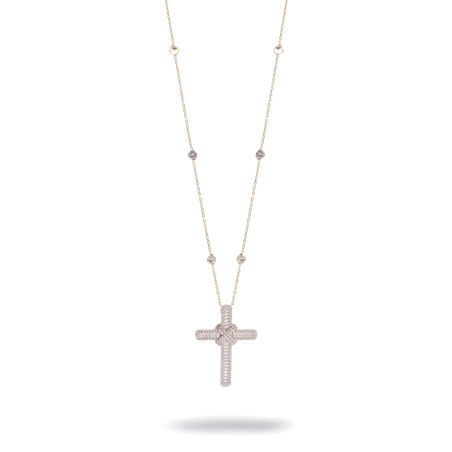 Gold station chain necklace with a baguette cubic zirconia cross pendant, front view