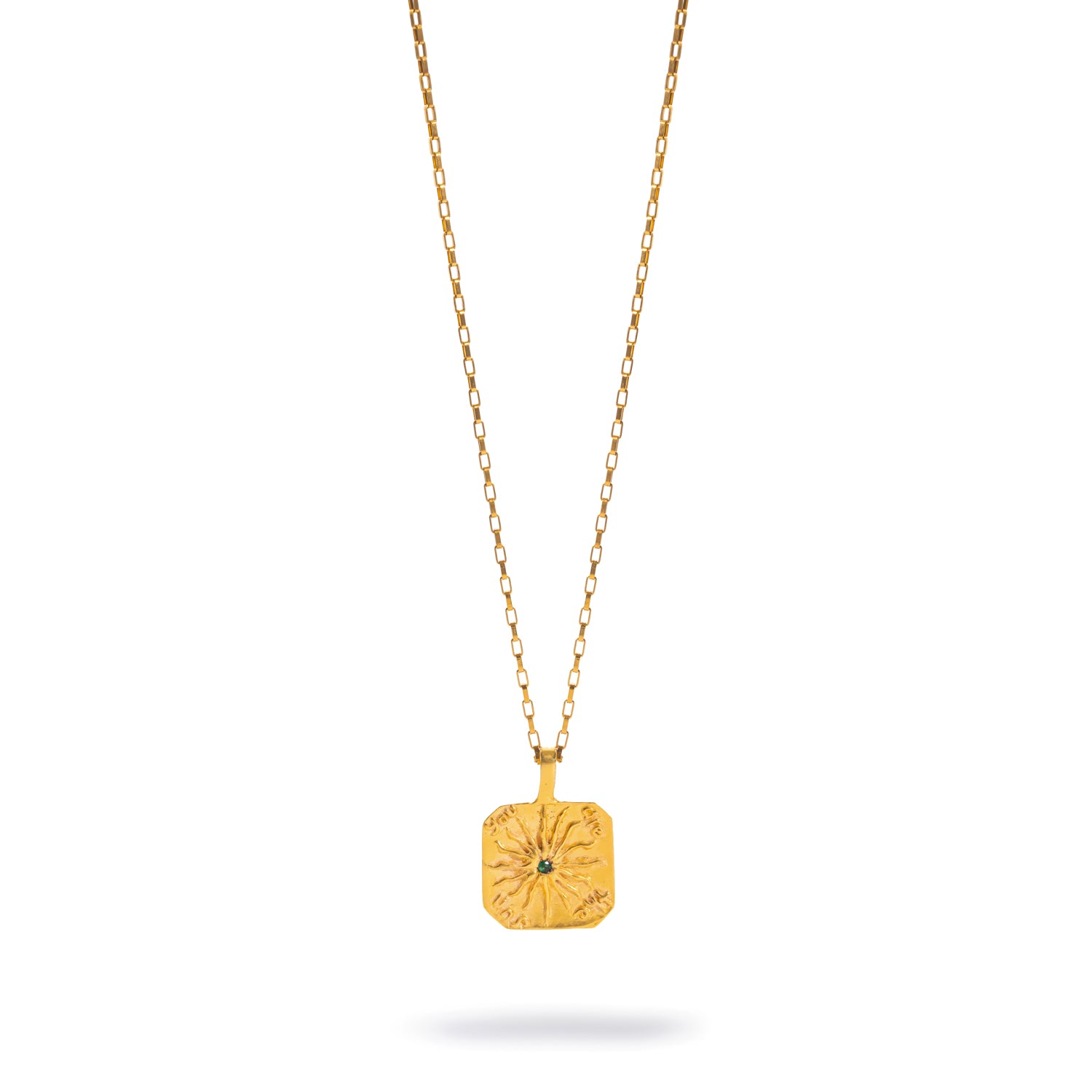 Gold square tablet pendant necklace engraved with you are the sun around a rayed sun with a green stone at its centre