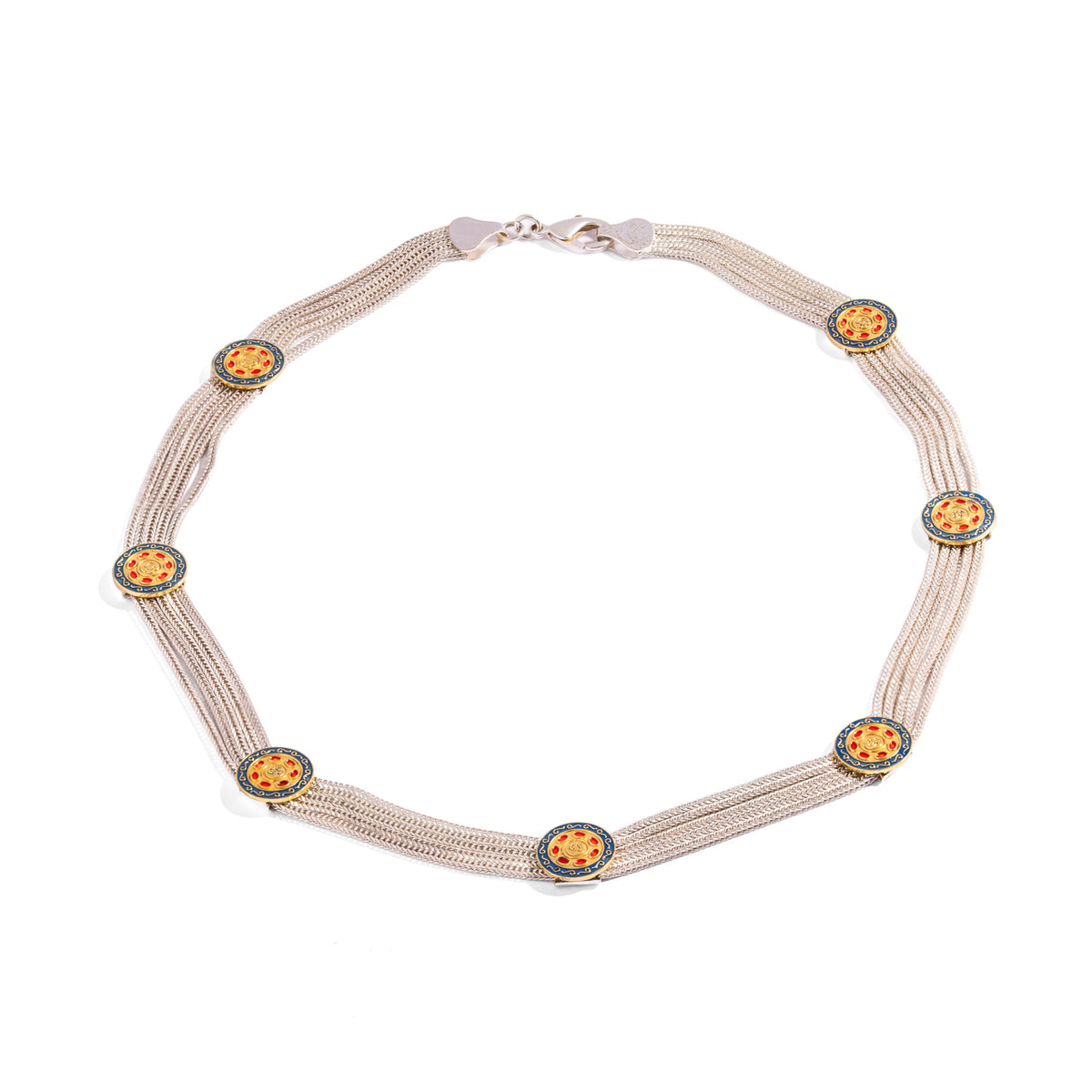 Cleopatra Mystic necklace laid flat, seven medallions along the silver strands and a lobster clasp