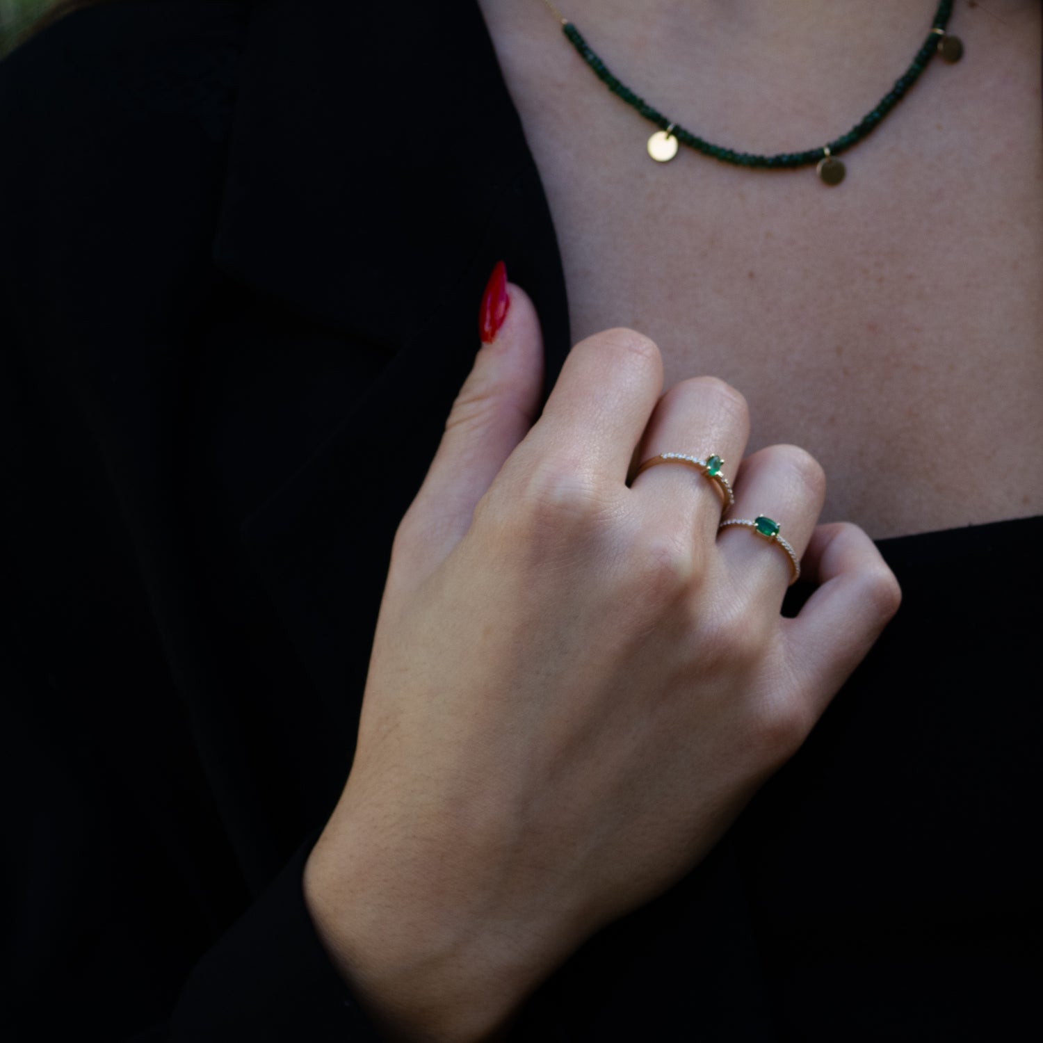 14K Yellow Gold Ring with Emerald Gemstone and Miniature Diamonds for a Sophisticated Design
