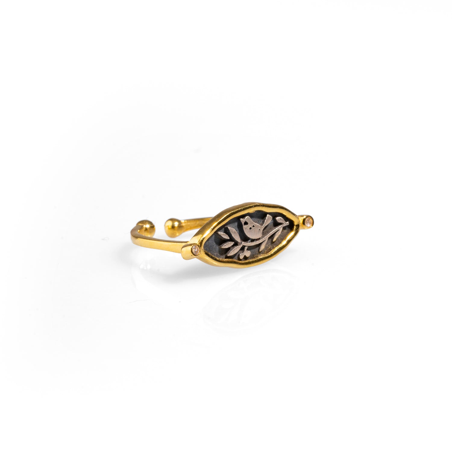 Refined adjustable signet ring with sterling silver olive leaf and bird engravings, framed with a luxurious 18k gold-plated edge