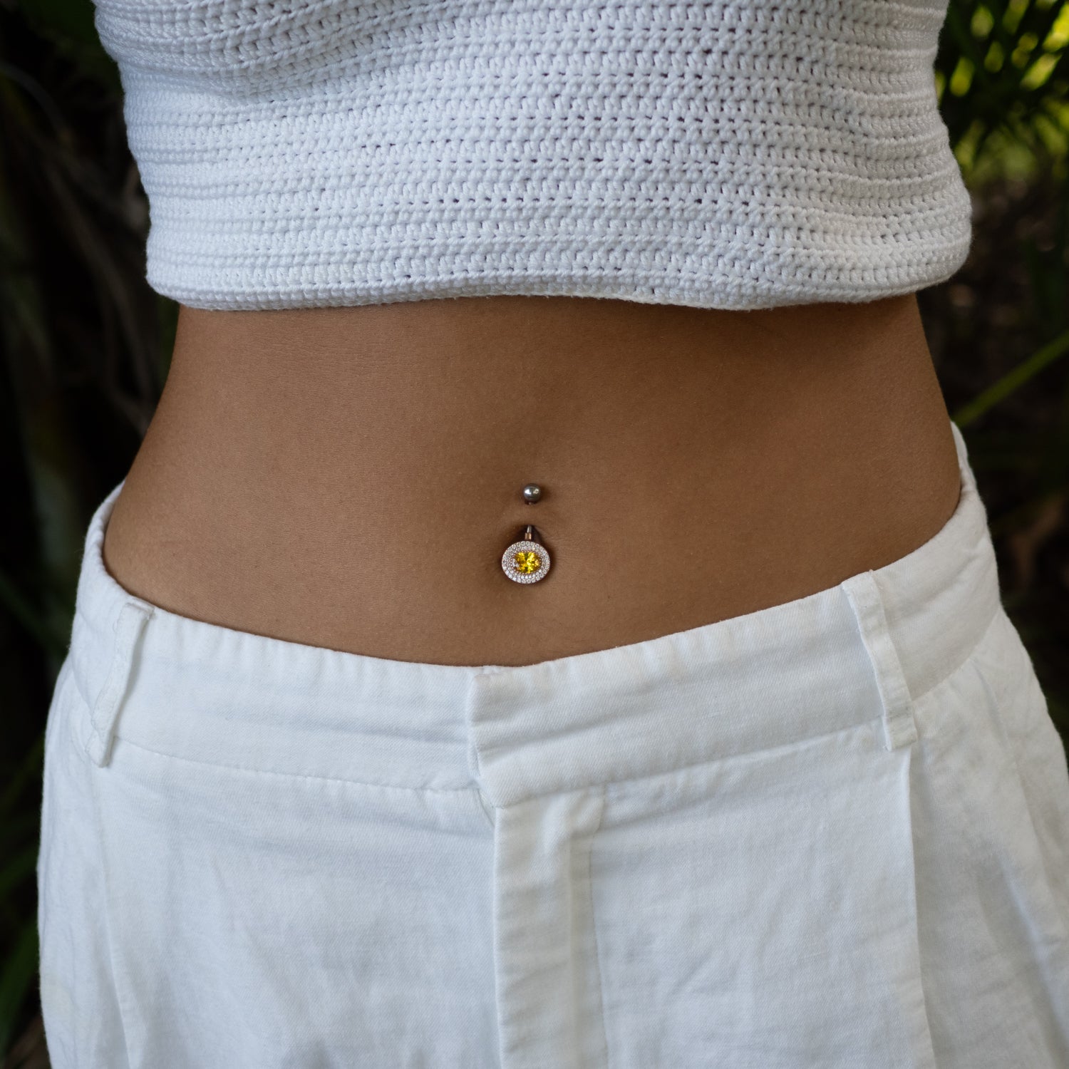 Sterling silver belly button piercing with oval citrine gemstone center, CZ diamond halo, rose gold finish, vibrant yellow, sparkly style.