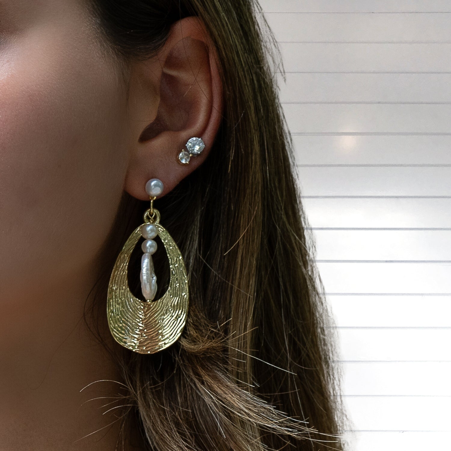 Ethereal Aura: Model in Gold &amp; Pearl Dangle Earrings, Boho Chic.