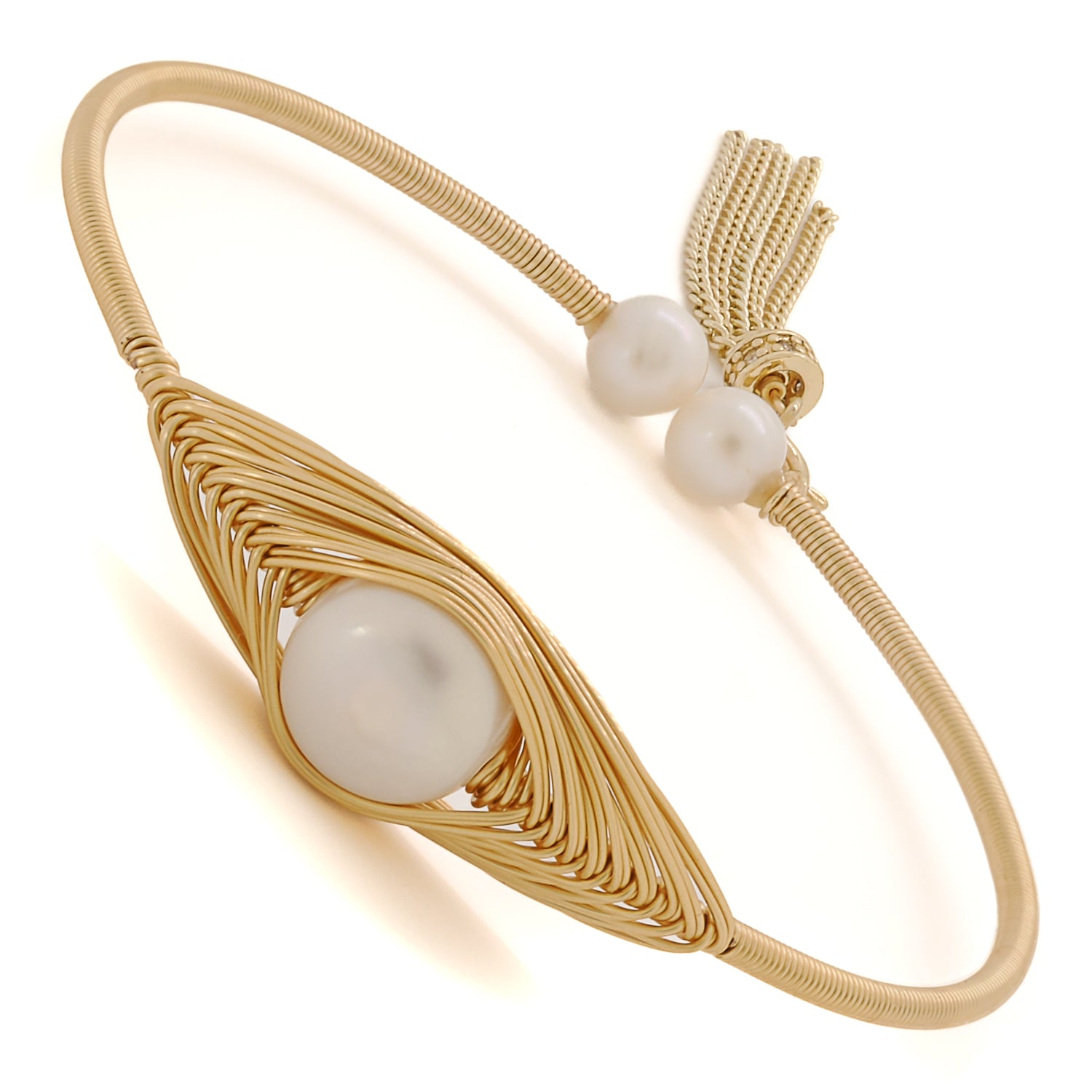 Elevate your elegance with the opulent Cleopatra Gold and Pearl Bangle Bracelet.