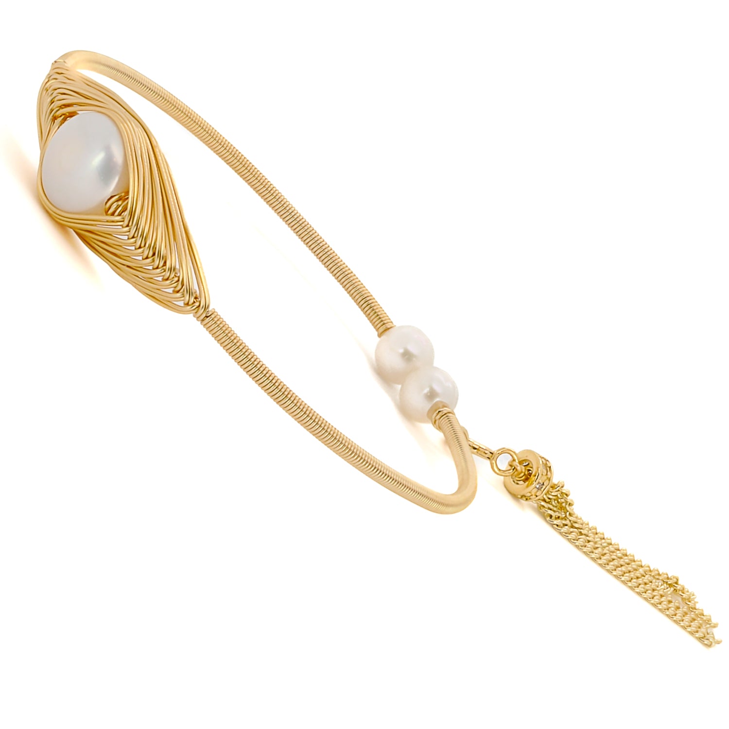 Modern charm with a touch of classic elegance: Cleopatra Pearl Bangle Bracelet.