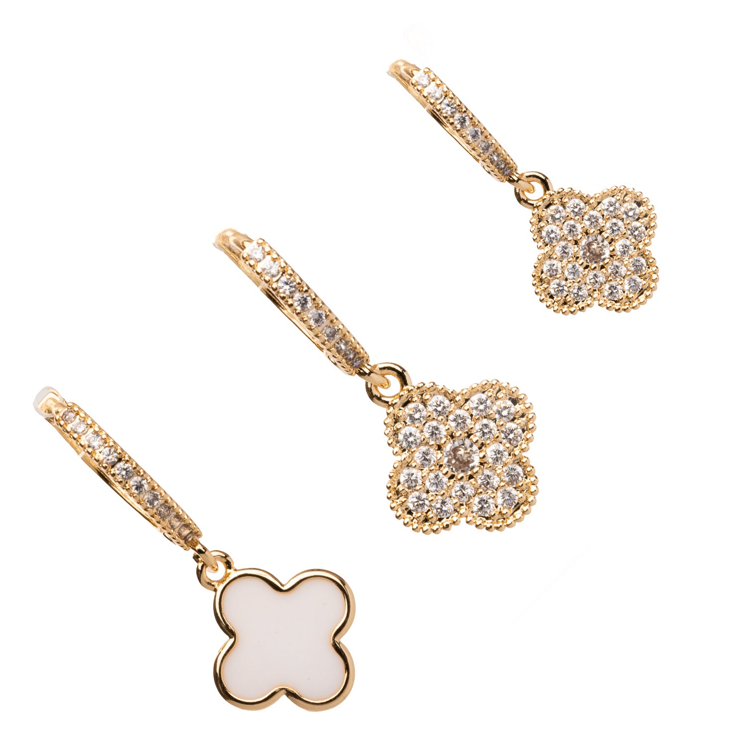 Trio of clover gold hoop earrings, featuring diamonds and white enamel, crafted for a stylish and fortunate appearance.