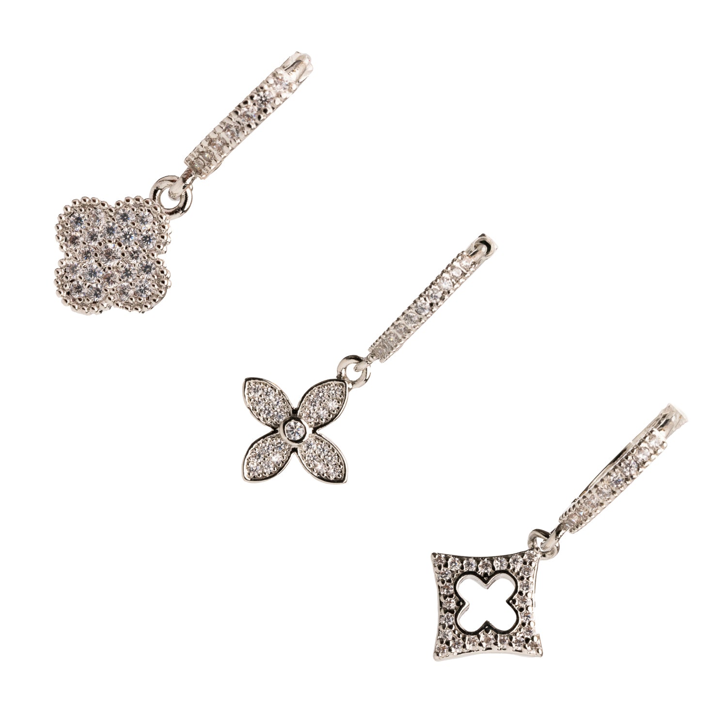 Set of three silver clover earrings with sparkling CZ diamonds, crafted for sophistication.