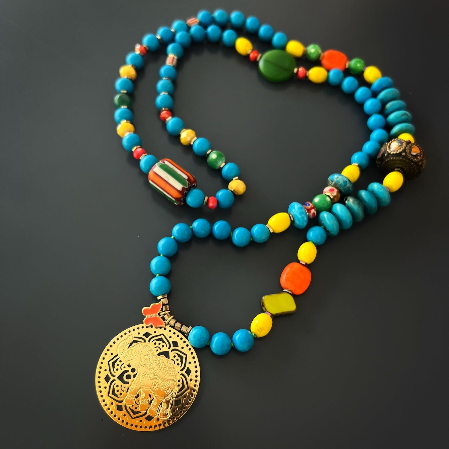 The Colorful Therapy Elephant Turquoise Necklace is not only a stunning accessory but also a therapeutic piece. 