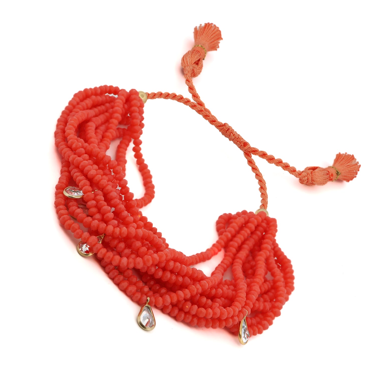 Elegant orange crystal bracelet with sterling silver charms, Swarovski elements, and adjustable tassels