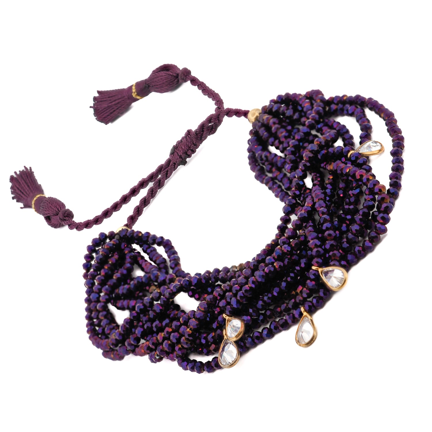 Purple multi-strand bracelet with radiant crystal beads, sterling silver accents, and Swarovski teardrop charms