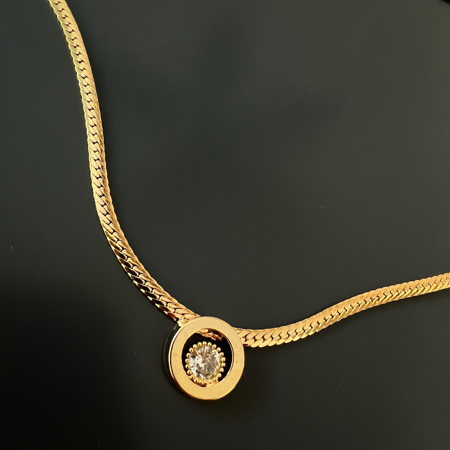 The Diamond and Gold Choker Necklace capturing its elegance and sophistication.