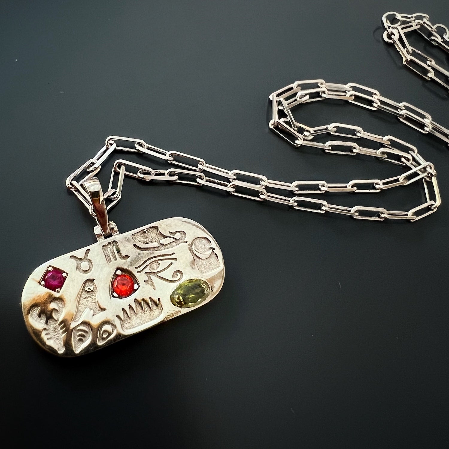 Sterling Silver Necklace with Egyptian Symbols Pendant, a unique and meaningful piece of handmade jewelry.