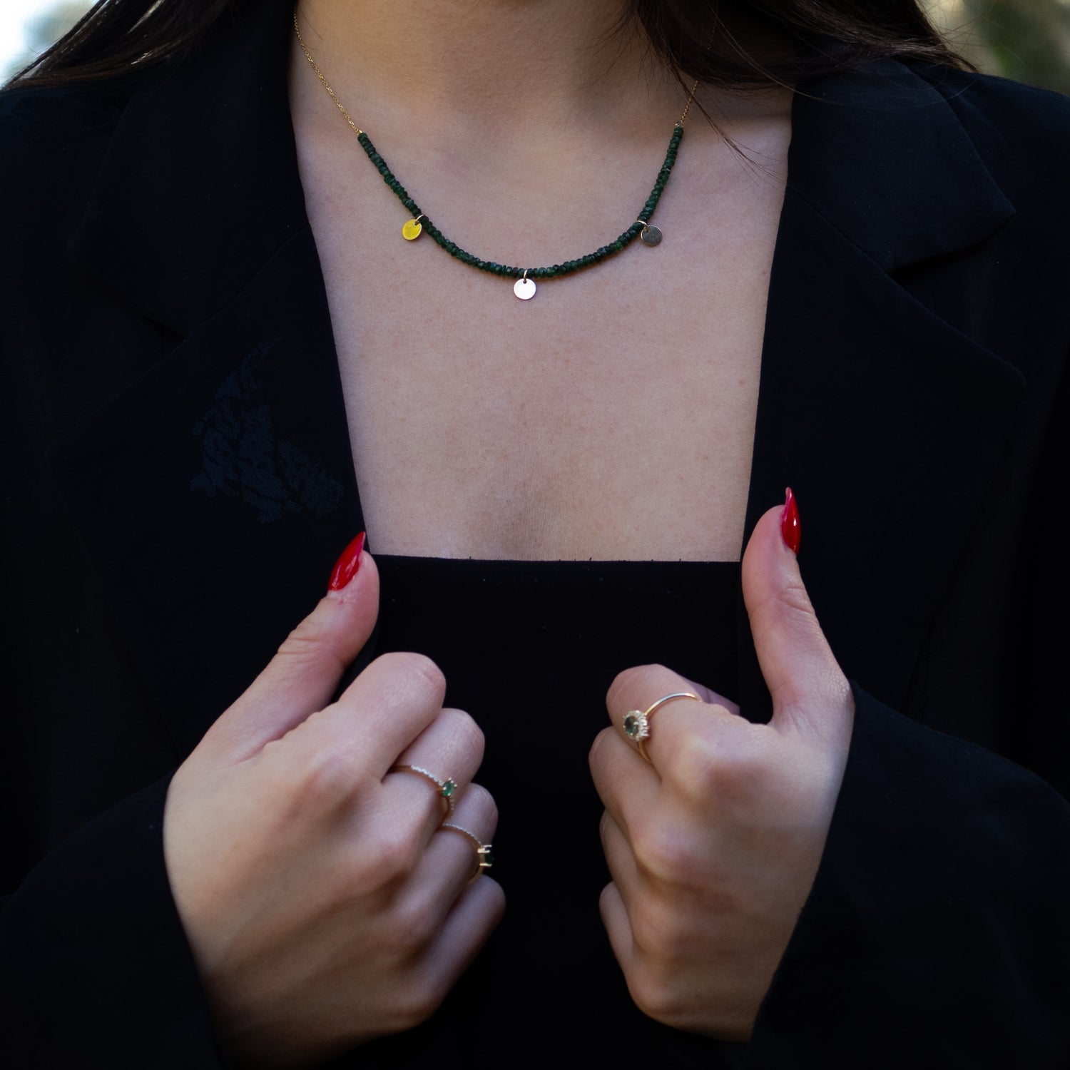 14K Yellow Gold Necklace with Emerald Gemstones and Charms for a Meaningful, Elegant Fashion Statement
