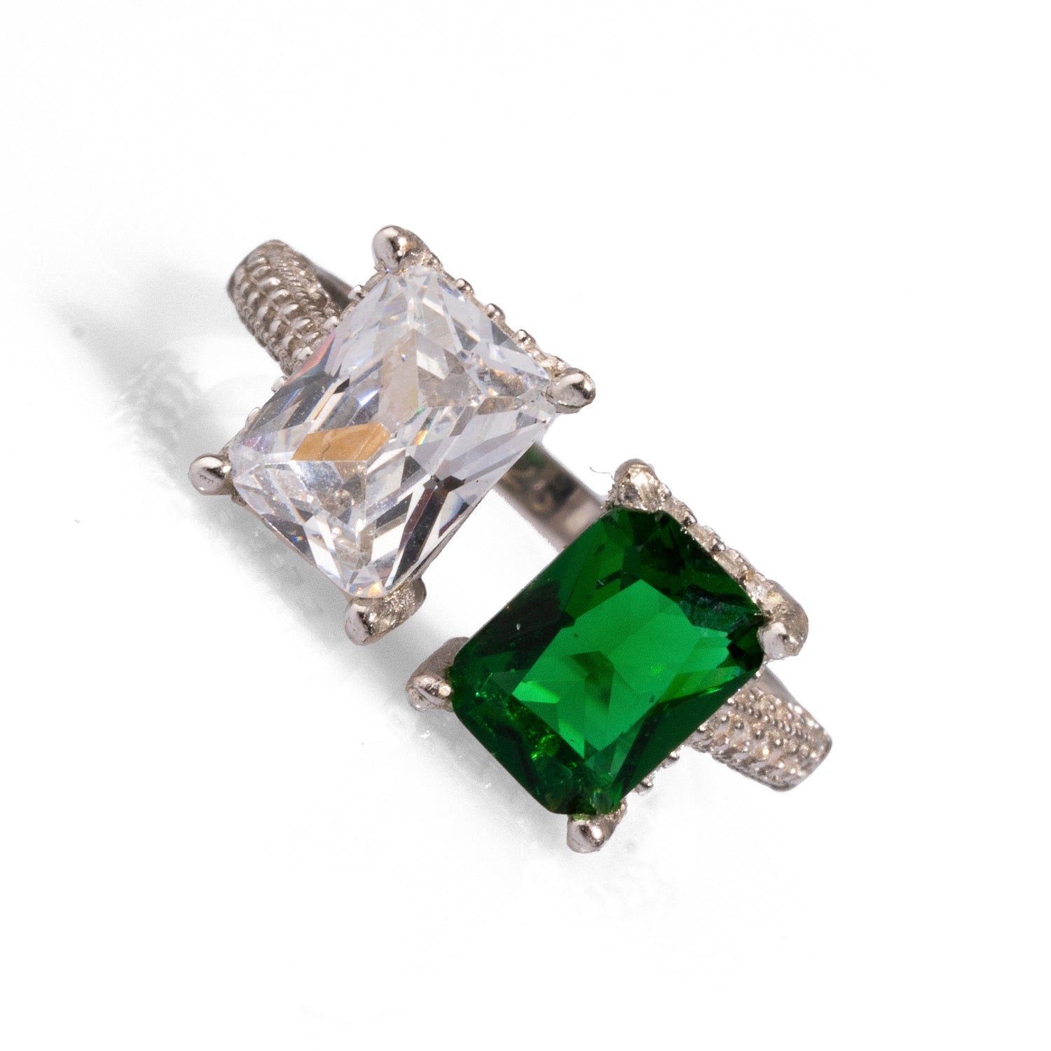 925 sterling silver ring with an emerald and diamond centerpiece, adorned with CZ diamonds