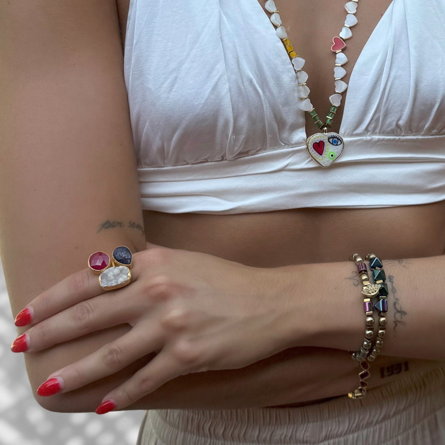 Model Wearing Fashionable Hematite Beaded Bracelet Set with Gold Plating