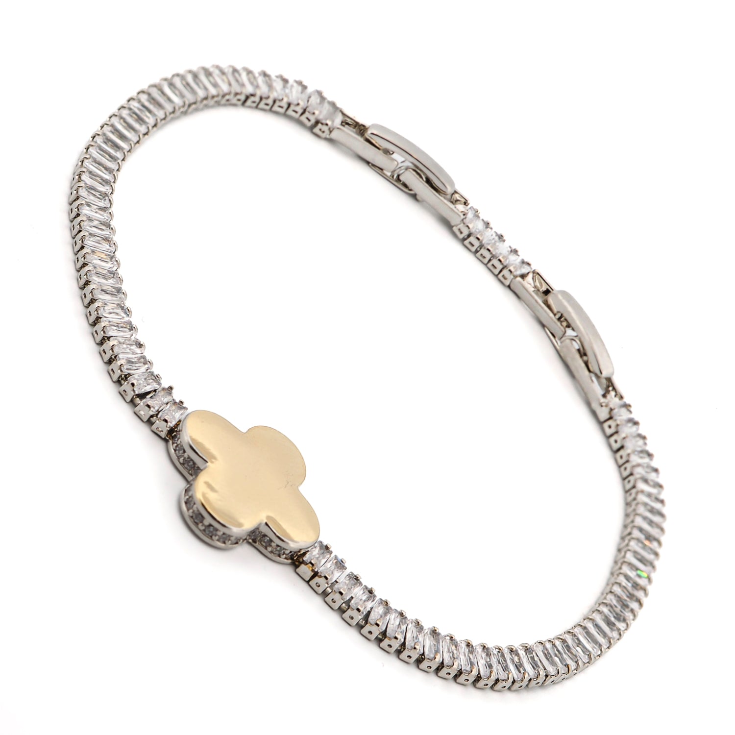 Elegant gold clover charm bracelet with baguette diamonds, perfect for daily wear or special occasions